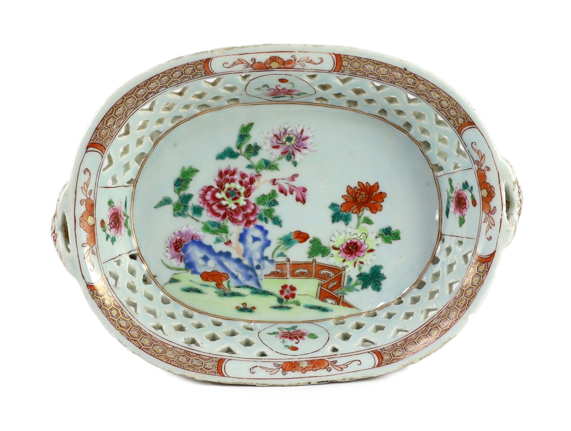 A Chinese famille rose oval two handled basket, Qianlong period, 31.5cm wide, chips to rim